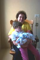 Foster holding her baby sister