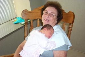Rylan asleep on Grandma's shoulder
